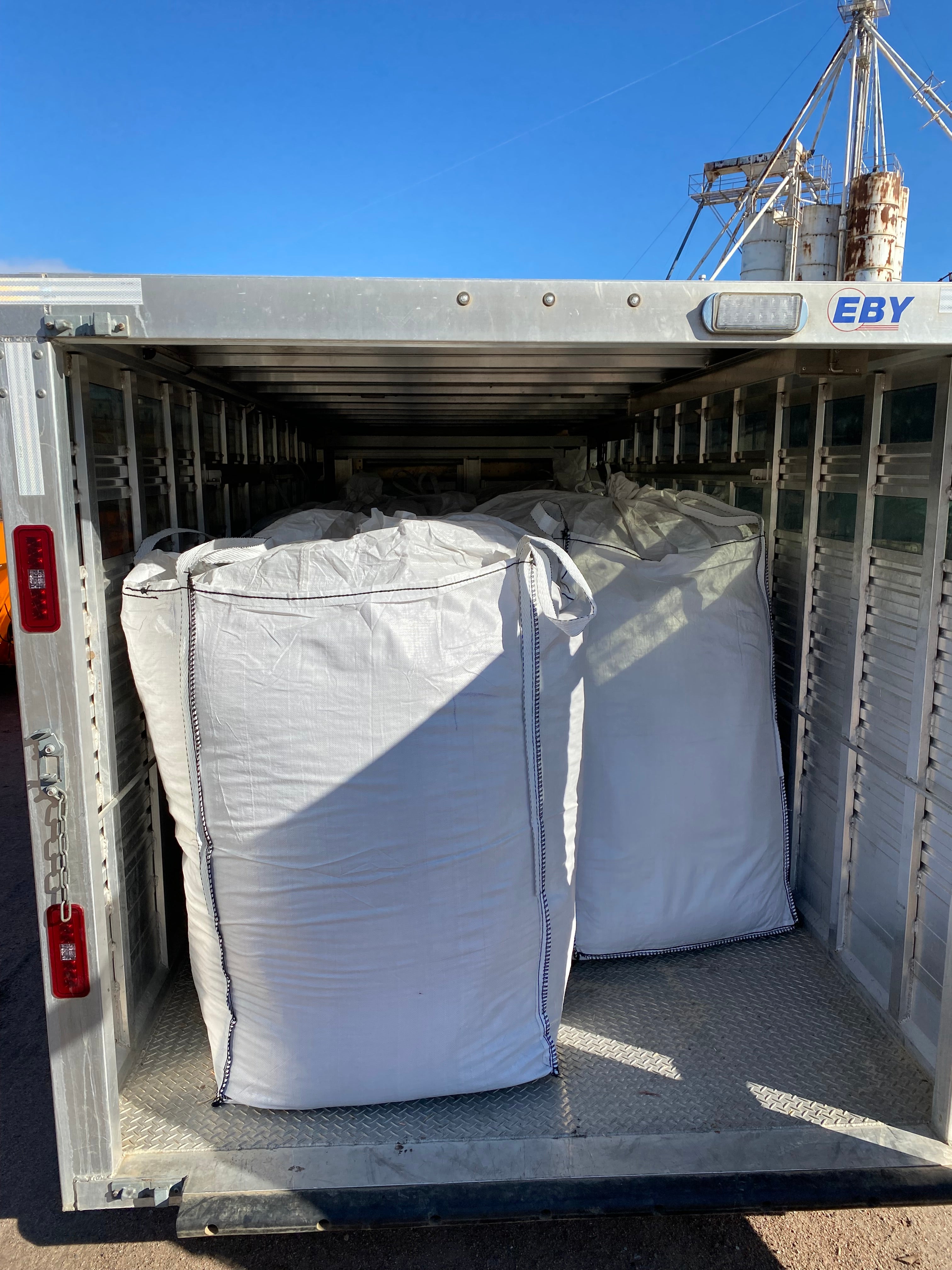 Cedar Barons Show Fiber Bagged loaded in EBY Livestock trailer 